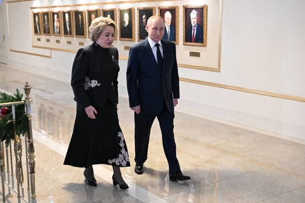 Russia Putin Parliament 9079179 24.12.2025 Russian President Vladimir Putin and Federation Council speaker Valentina Matvienko talk before a session at the Federation Council, the Upper House of the Russian Parliament, in Moscow, Russia. Dmitriy Duhanin Sputnik Moscow Russia Copyright: xDmitriyxDuhaninx