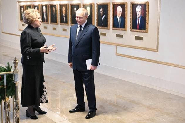 Russia Putin Parliament 9079194 24.12.2025 Russian President Vladimir Putin and Federation Council speaker Valentina Matvienko talk before a session at the Federation Council, the Upper House of the Russian Parliament, in Moscow, Russia. Dmitriy Duhanin Sputnik Moscow Russia Copyright: xDmitriyxDuhaninx