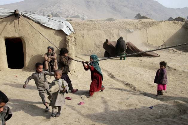 World Refugee Day in Afghanistan AFGHANISTAN, KABUL - JUNE 20: Afghan refugee children are seen at a refugee camp outskirt of Kabul Afghanistan on World Refugee Day, June 20, 2015. World Refugee Day, observed June 20th each year, is dedicated to raising awareness of the situation of refugees throughout the world. Kabul Kabol. Editorial use only. Please get in touch for any other usage.  Copyright: x2025xAnadoluxHaroonxSabawoonx