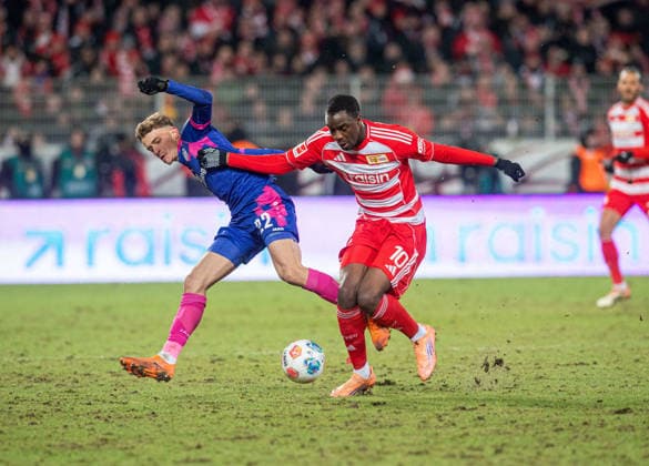 Soccer, Men, Season 2025 2026, 1 Bundesliga 16 Matchday , 1 FC Union Berlin 1 FSV Mainz 05, v l Nikolas Veratschnig Mainz , Ilyas Ansah 1 FC Union Berlin , 10 01 2026, Copyright: xSebastianxRäppold MatthiasxKochx