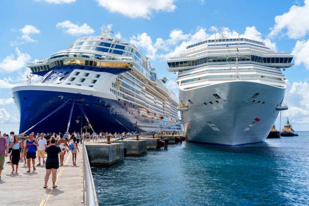 Basseterre, St. Kitts, St. Kitts and Nevis - January 9, 2026: The cruise ships Costa Pacifica of the Costa shipping company and Celebrity Ascent of the Celebrity Cruises shipping company are moored in the port of Basseterre on St. Kitts and Nevis. The port serves as an important cruise base in the Caribbean