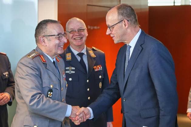 Berlin, Germany, 20 01 2026 Federal Chancellery New Years reception for the families of soldiers and police officers deployed abroad General Carsten Breuer, Inspector General of the Bundeswehr and Federal Chancellor Friedrich Merz CDU Copyright: xdtsxNachrichtenagenturx dts_102625