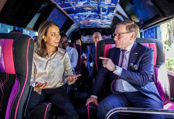 Johann Wadephul CDU , Federal Foreign Minister, photographed on the sidelines of his trip to Kenya Here during a ride on a matatu bus with influencer Shiksha Arora These are mostly colorful, privately operated shared cabs or minibuses and are very common in Kenya Photographed on behalf of the Federal Foreign Office Nairobi Kenya Copyright: xThomasxKoehler AAx