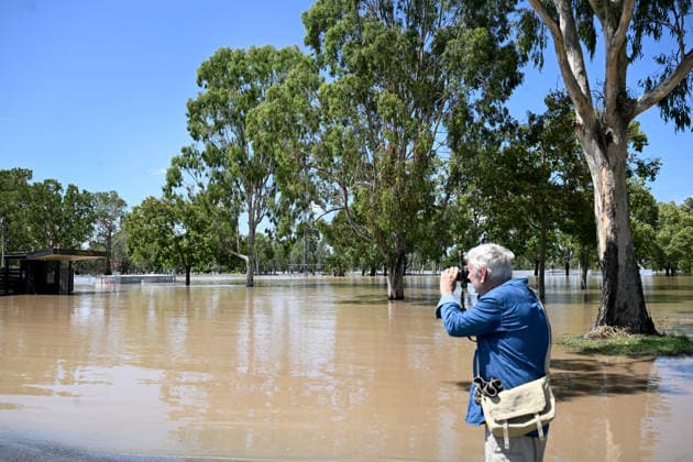 QUEENSLAND FLOODS, Floodwaters from the Fitzroy River inundate Robert Clark Drive and the access road to the Callaghan Racecourse and touch footy ground in Rockhampton, Queensland, Thursday, January 22, 2026. ( NO ARCHIVING Rockhampton Queensland Australia  Copyright: xSYLVIAxLIBERx 20260122166246081954