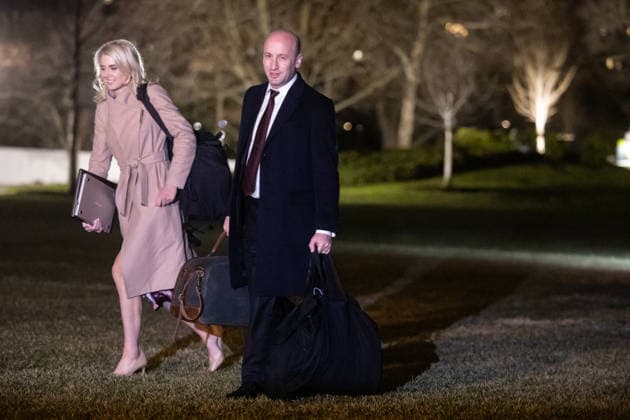 Executive Assistant to the President Natalie Harp and White House Deputy Chief of Staff Stephen Miller walk on the South Lawn of the White House in Washington, DC after disembarking from Marine One on Thursday, January 22, 2026. WASP20260122105 FrancisxChung POLITICO
