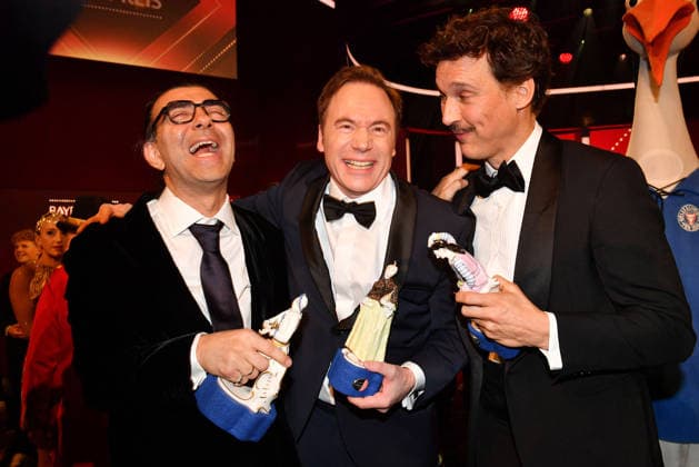 Award winners Fatih AkÄ±n, Michael Herbig and Florian David Fitz pose on stage at the Bavarian Film Awards 2026 at Prinzregententheater on January 23, 2026 in Munich, Germany 47th Bavarian Film Awards Bayerischer Filmpreis in Munich, Germany