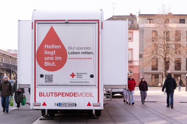 Vehicle set up to Blood donation in the City centre from Mainz 1103504283