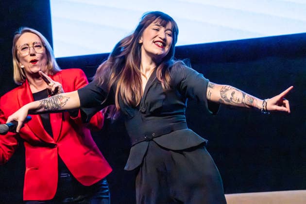 Heidi Reichinnek, 37, parliamentary group leader Die Linke in the Bundestag, dances on stage, election campaign event Die L