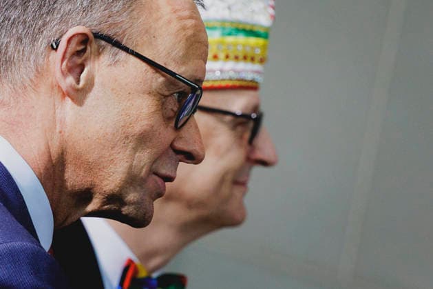L R Friedrich Merz CDU , Federal Chancellor, and Klaus Ludwig Fess, President of the Bund Deutscher Karneval e V , taken during the traditional carnival reception at the Federal Chancellery in Berlin, 03 02 2026 Berlin Germany Copyright: xFlorianxGaertnerx
