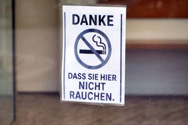 Smoking ban in a Building, Friendly Note at a Shield to the Front door 1131607806