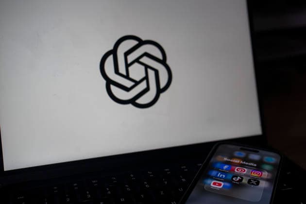 Symbol image Logo of the AI company OpenAI CHAT GPT on a laptop screen next to a smartphone showing social media apps Photo taken February 6, 2026 Concept image Logo of the artificial intelligence company OpenAI displayed on a laptop screen next to a smartphone showing social media applications Photo taken February 6, 2026 Copyright: MarcoxBader