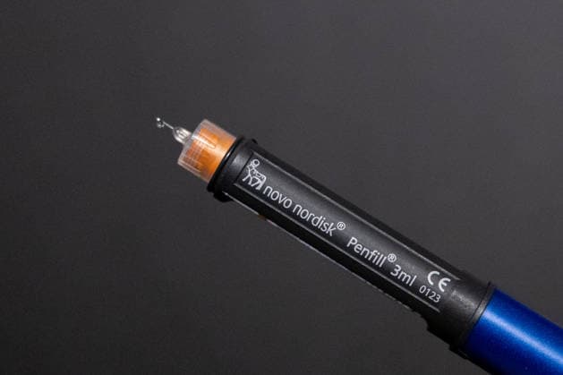 Insulin syringe from Novo Nordisk Symbolic image Close-up of a refillable insulin syringe from the pharmaceutical company Novo Nordisk for the administration of insulin in diabetes Symbolic image Bonn North Rhine-Westphalia Germany Copyright: xMarcxJohnx