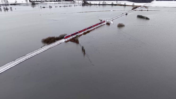 The rainfall of recent weeks has flooded several fields in Niddderau Eichen Roads are under water and no longer passable Only the local railroad line can still be used, as it protrudes from the flooded area Nidderau Eichen Hessen Germany