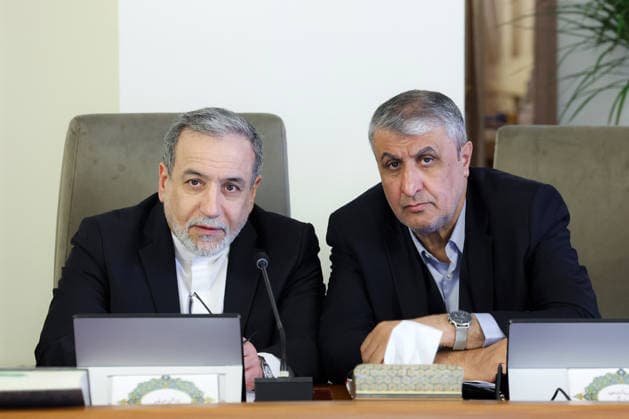 February 18, 2026, Tehran, Iran: Iranian Foreign Minister ABBAS ARAGHCHI (L) and the head of the Atomic Energy Organization of Iran (AEOI) MOHAMMAD ESLAMI attend a government meeting in Tehran. Tehran Iran - ZUMAi98_ 20260218_zih_i98_008 Copyright: xIranianxPresidencyx