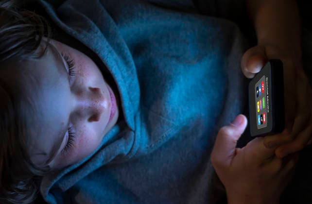 Symbolic image Social media use by young people, children, boy, 12 years old, folder with various social media platforms on cell phone, social media
