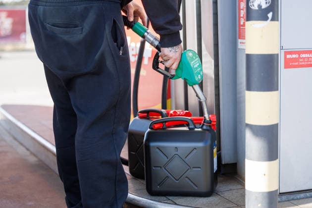 13 03 2026 German citizens fill up their vehicles with fuel in Poland because the price per liter in Germany is over two euros A canister being filled with fuel Dobra Lubieszyn Western Pomerania Poland