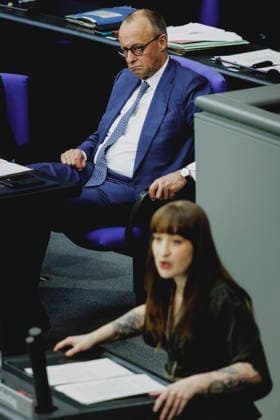 L R Friedrich Merz CDU , Federal Chancellor, and Heidi Reichinnek, Member of the German Bundestag Die Linke , taken during the debate on the government declaration in the German Bundestag in Berlin, 18 03 2026 Berlin Germany Copyright: xFlorianxGaertnerx