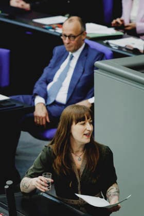 L R Friedrich Merz CDU , Federal Chancellor, and Heidi Reichinnek, Member of the German Bundestag Die Linke , taken during the debate on the government declaration in the German Bundestag in Berlin, 18 03 2026 Berlin Germany Copyright: xFlorianxGaertnerx