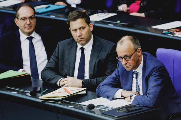 R L Friedrich Merz CDU , Federal Chancellor, Lars Klingbeil, Federal Minister of Finance, and Alexander Dobrindt CSU , Federal Minister of the Interior, recorded during the debate on the government declaration in the German Bundestag in Berlin, 18 03 2026 Berlin Germany Copyright: xFlorianxGaertnerx