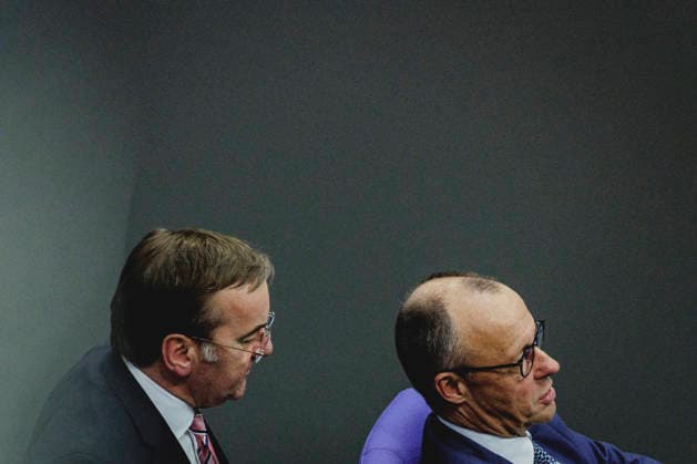 R L Friedrich Merz CDU , Federal Chancellor, and Boris Pistorius SPD , Federal Minister of Defense, recorded during the debate on the government declaration in the German Bundestag in Berlin, 18 03 2026 Berlin Germany Copyright: xFlorianxGaertnerx