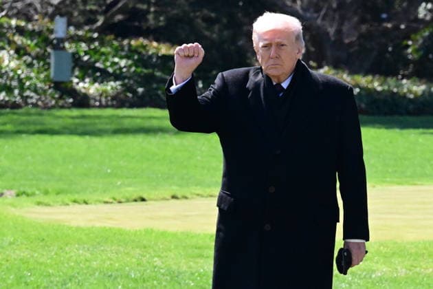 President Donald Trump Departs The White House (INT) President Donald Trump gestures a wave as he departs the White House with United States Secretary of War Pete Hegseth and United States Chairman of the Joint Chiefs of Staff Dan Caine in Washington, D.C., on March 18, 2026 for a trip to Dover Air Force Base for a dignified transfer where the remains of six U.S. service members killed in the crash of a refueling aircraft are returned to their families. It will be the second time since launching the war with Iran on Feb. 28 that the Republican president will attend the solemn military ritual known as a dignified transfer, which he once described as the toughest thing he has had to do as commander in chief. Credit: Kyle Mazza Thenews2  Copyright: xKylexMazzax