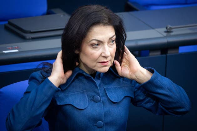 German Bundestag, 68th plenary session Katherina Reiche, Federal Minister for Economic Affairs and Energy straightens her hair on the government bench at the 68th session of the German Bundestag in Berlin, 26 03 2026 Berlin Berlin Germany