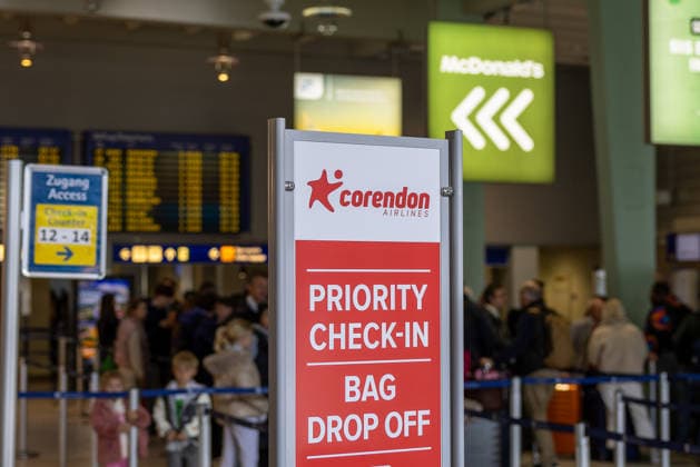 Press conference on the stationing of a second Corendon aircraft at Albrecht Dürer Airport, Nuremberg, 27 03 2026 A Corendon Airlines sign in the terminal at Nuremberg Airport indicates priority check-in and baggage drop-off In the background are waiting travelers and display boards in the departure area Nuremberg Bavaria Germany 20260327-286A1931-M4000