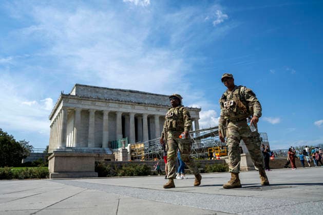 Members of the National Guard patrol near the Lincoln Memorial in Washington, DC on Tuesday, March 31, 2026. The Pentagon plans to maintain the National Guard s federal mission in Washington, DC, until Jan. 20, 2029, through the rest of President Donald Trump s second term.  WAP20260331302 BONNIExCASH