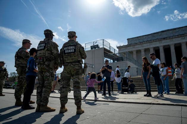 Members of the National Guard patrol near the Lincoln Memorial in Washington, DC on Tuesday, March 31, 2026. The Pentagon plans to maintain the National Guard s federal mission in Washington, DC, until Jan. 20, 2029, through the rest of President Donald Trump s second term.  WAP20260331323 BONNIExCASH