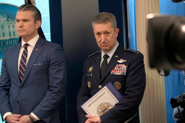 United States Secretary of War Pete Hegseth, left, and US Air Force General Dan Caine, Chair, Joint Chiefs of Staff, right, listen as US President Donald J Trump conducts a press conference in the James S Brady Press Briefing Room of the White House in Washington, DC, USA, on Monday April 6, 2026. The President is expected to take questions on the Iran War and oil prices. Copyright: xIndependentxStillxPoolxphotox 2026xAbacaUSAxfromxConsolidatedxNewsxPhotosxAllxRightsxReservex MediaPunchx