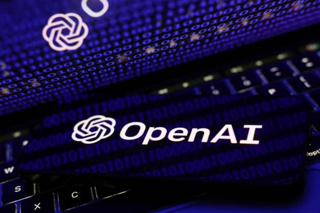 AI Photo Illustrations A binary code displayed on a laptop screen and OpenAI logo displayed on a phone screen are seen in this illustration photo taken in Krakow, Poland on April 8, 2026. Krakow Poland  Copyright: xJakubxPorzyckix originalFilename: porzycki-aiphotoi260408_npWKN.jpg