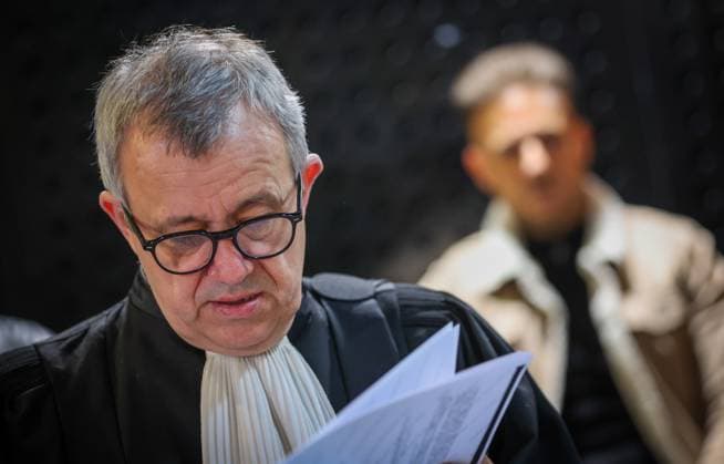 Lawyer Frank Discepoli, defending P. Falzone and The accused Paolo Falzone pictured during the composition of the jury for the trial of P. and A. Falzone, at the Court of Appeal of Mons, on Thursday 23 April 2026. The trial of the two cousins concerns the 2022 tragedy in Strepy-Bracquegnies, where a car plowed into a carnival parade around 5:00. Six people died at the scene, and a seventh months later in the hospital. P. Falzone is charged with seven murder and 81 attempted murder. A. Falzone with failure to render aid to a person in danger.  VIRGINIExLEFOUR 171741773