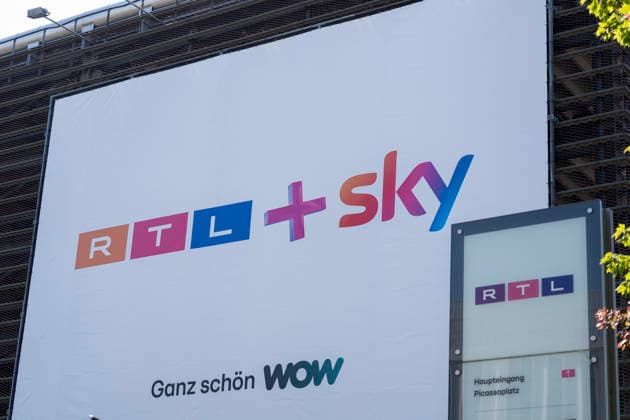A poster with the slogan RTL Sky ganz schön WOW hangs at the entrance to a parking garage on the grounds of RTL Deutschland Following a competition law review, the EU Commission has approved the takeover of Sky Deutschland by RTL Group RTL Medienunternehmen Firmensitz am Kölner Messeturm The headquarters of TV broadcaster RTL at Pic Copyright: MarcoxBader