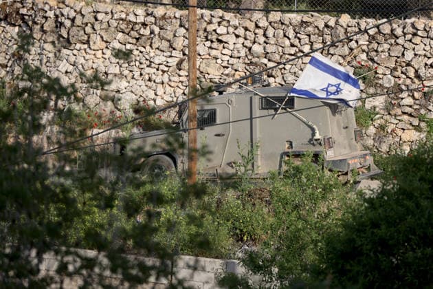 Palestinians evacuate home after Israeli Settler attack in West Bank WEST BANK, PALESTINE - APRIL 27: Israeli forces patrol the area after Palestinian-owned houses were set on fire by Israeli settlers in the village of Jalud, south of Nablus, West Bank, Palestine on April 27, 2026. A group of settlers, under the protection of Israeli soldiers, attacked Palestinians and their homes with stones and Molotov cocktails, leading to property damage and the evacuation of usable items from affected houses. Issam Rimawi Anadolu Nablus West Bank. Editorial use only. Please get in touch for any other usage.  Copyright: x2026xAnadoluxIssamxRimawix