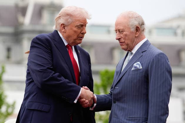 President Donald Trump shakes hands with Britain s King Charles III on the podium during an official welcoming ceremony at the White House in Washington DC on Tuesday, April 28, 2026. The king is on a four-day state visit to the U.S. and will stop in New York and Washington, where he will meet with U.S. officials and deliver an address to Congress. WAX20260428839 YURIxGRIPAS