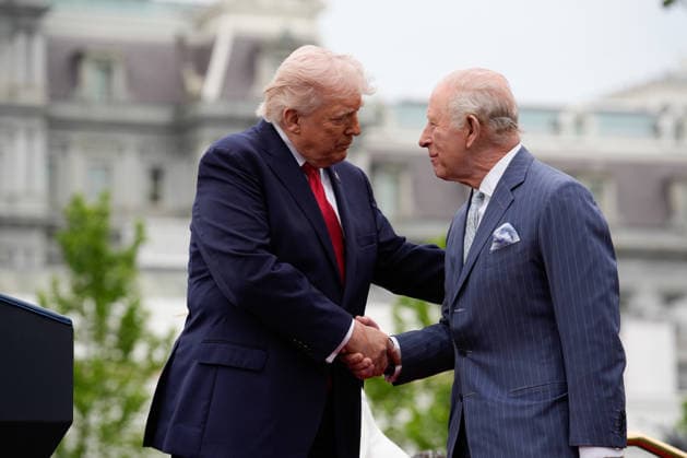 President Donald Trump shakes hands with Britain s King Charles III on the podium during an official welcoming ceremony at the White House in Washington DC on Tuesday, April 28, 2026. The king is on a four-day state visit to the U.S. and will stop in New York and Washington, where he will meet with U.S. officials and deliver an address to Congress. WAX20260428840 YURIxGRIPAS