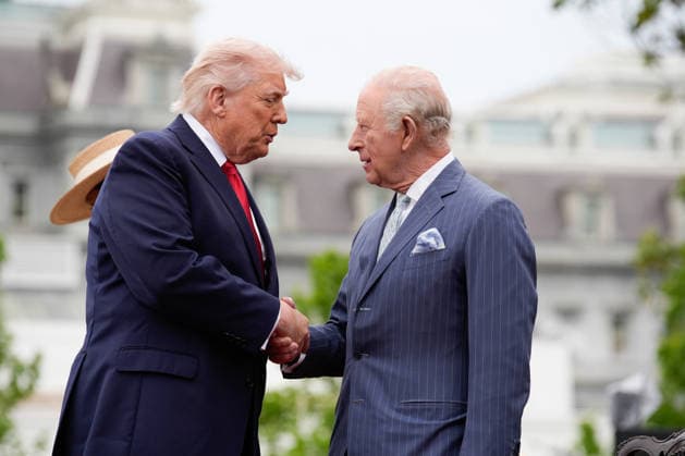 President Donald Trump shakes hands with Britain s King Charles III on the podium during an official welcoming ceremony at the White House in Washington DC on Tuesday, April 28, 2026. The king is on a four-day state visit to the U.S. and will stop in New York and Washington, where he will meet with U.S. officials and deliver an address to Congress. WAX20260428841 YURIxGRIPAS