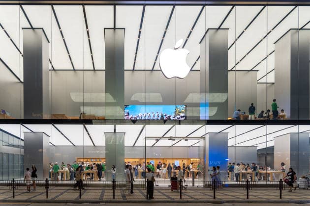 People s Republic of China, Hong Kong April 26, 2026: The modern Apple Store in Hong Kong is bustling with customers shopping for technology. The scene symbolizes innovation, digitalization, and high demand for electronic products.