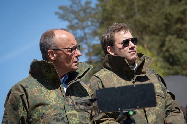 Federal Chancellor Friedrich Merz on the left with his Vice-Chancellor and Federal Finance Minister Lars Klingbeil Federal Chancellor Friedrich Merz visits the Bundeswehr army, Munster Lower Saxony Germany Munster military training area