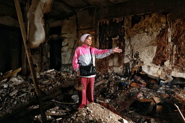 A woman stands among the rubble in an apartment block damaged by a Russian drone strike, Odesa, Ukraine, April 30, 2026. Russian forces launched a massive drone attack on the city, damaging a kindergarten, two schools, residential buildings, a parking lot, nearby garages, and a hotel. Twenty people were injured, including a 17-year-old boy. (Photo by Nina Liashonok Ukrinform) Large-scale Russian drone attack on Odesa Copyright: xNinaxLiashonokx