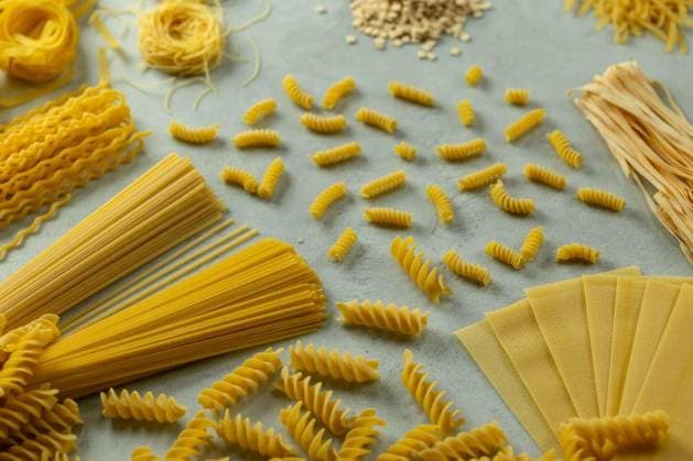 Various types of uncooked pasta creating a patterns and textures on a light surface Copyright: xphbcz_1x Panthermedia101098488.jpg