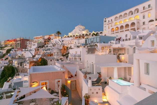 White architecture and churches at sunset in Fira, Santorini, Greece Copyright: xkavalenkavax Panthermedia101162600.jpg