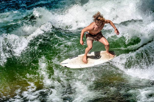 The famous surf wave is running again Surfers on the Eisbach wave a