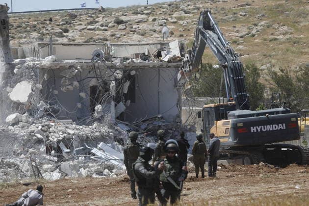 Israeli forces demolish Palestinian home in Hebron-area village Israeli army forces, accompanied by bulldozers, demolish a Palestinian home in the village of al-Deirat, east of Yatta, south of Hebron in the West Bank, on May 4, 2026. The demolition left a family, including children, displaced, as the operation was carried out under military presence that prevented residents from approaching, amid ongoing demolitions in various areas across the West Bank. Photo by Mamoun Wazwaz apaimages Hebron West Bank Palestinian Territory 040526_Hebron_MW_00(43) Copyright: xapaimagesxMamounxWazwazx xapaimagesx
