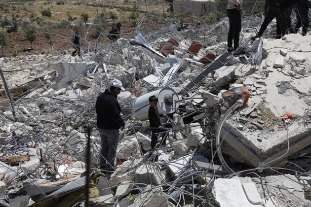 Israeli forces demolish Palestinian home in Hebron-area village Israeli army forces, accompanied by bulldozers, demolish a Palestinian home in the village of al-Deirat, east of Yatta, south of Hebron in the West Bank, on May 4, 2026. The demolition left a family, including children, displaced, as the operation was carried out under military presence that prevented residents from approaching, amid ongoing demolitions in various areas across the West Bank. Photo by Mamoun Wazwaz apaimages Hebron West Bank Palestinian Territory 040526_Hebron_MW_00(47) Copyright: xapaimagesxMamounxWazwazx xapaimagesx