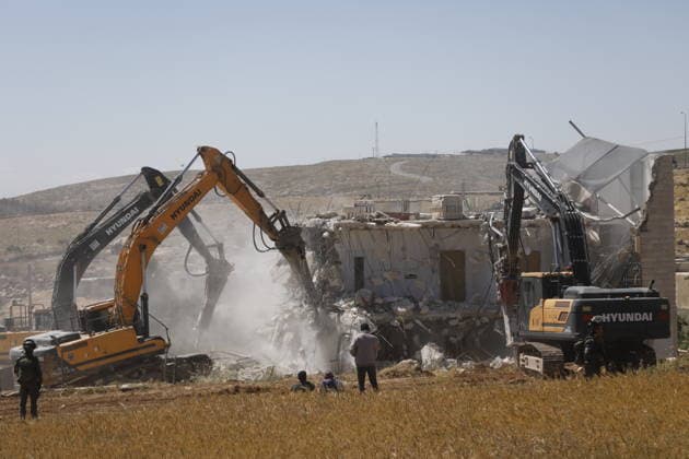 Israeli forces demolish Palestinian home in Hebron-area village Israeli army forces, accompanied by bulldozers, demolish a Palestinian home in the village of al-Deirat, east of Yatta, south of Hebron in the West Bank, on May 4, 2026. The demolition left a family, including children, displaced, as the operation was carried out under military presence that prevented residents from approaching, amid ongoing demolitions in various areas across the West Bank. Photo by Mamoun Wazwaz apaimages Hebron West Bank Palestinian Territory 040526_Hebron_MW_00(32) Copyright: xapaimagesxMamounxWazwazx xapaimagesx