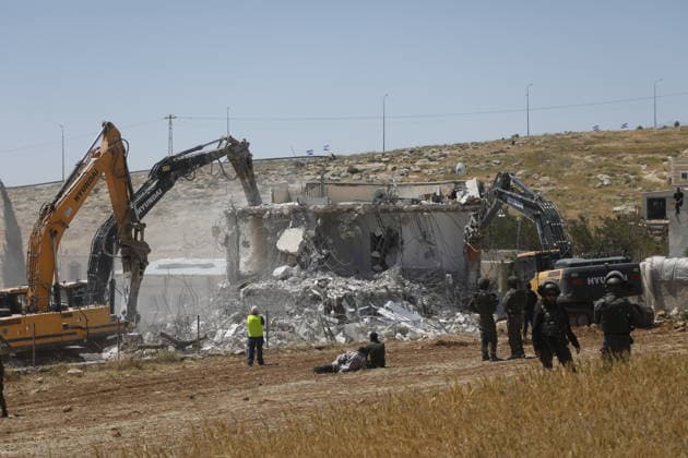 Israeli forces demolish Palestinian home in Hebron-area village Israeli army forces, accompanied by bulldozers, demolish a Palestinian home in the village of al-Deirat, east of Yatta, south of Hebron in the West Bank, on May 4, 2026. The demolition left a family, including children, displaced, as the operation was carried out under military presence that prevented residents from approaching, amid ongoing demolitions in various areas across the West Bank. Photo by Mamoun Wazwaz apaimages Hebron West Bank Palestinian Territory 040526_Hebron_MW_00(42) Copyright: xapaimagesxMamounxWazwazx xapaimagesx