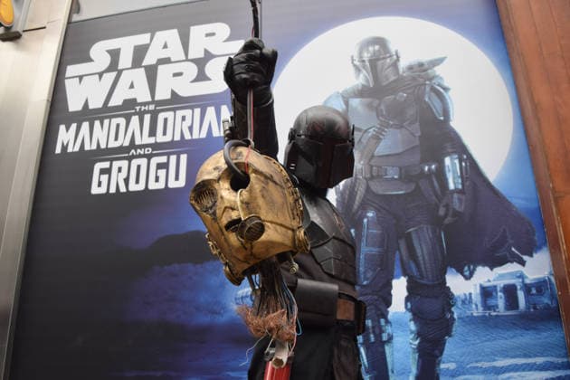 May 4, 2026, London, England, United Kingdom: A performer wearing a Mandalorian costume holds the severed head of C-3PO outside the Disney store on Oxford Street on Star Wars Day. The beloved sci-fi franchise is celebrated each year on May 4th, a pun on the famous phrase May The Force Be With You. London United Kingdom - ZUMAv130 20260504_zip_v130_003 Copyright: xVukxValcicx