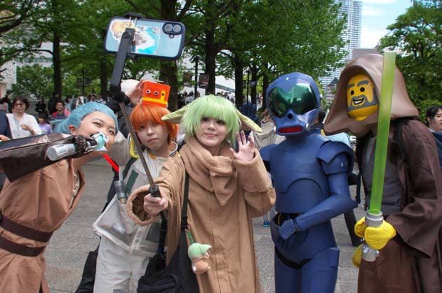 A Star Wars fan dressed takes a selfie during the event Star Wars Day in Yokohama, Kanagawa-Prefecture, Japan on Sunday, May 4, 2026.  TKP2026050407 KEIZOxMORI