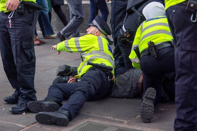 . 04 05 2026. London, United Kingdom. London May Day March. Police detain two men at the annual London May Day March from Clerkenwell Green to Trafalgar Square.where a rally is held.  xMartynxWheatleyx xi-Imagesx IIM-26745-0001